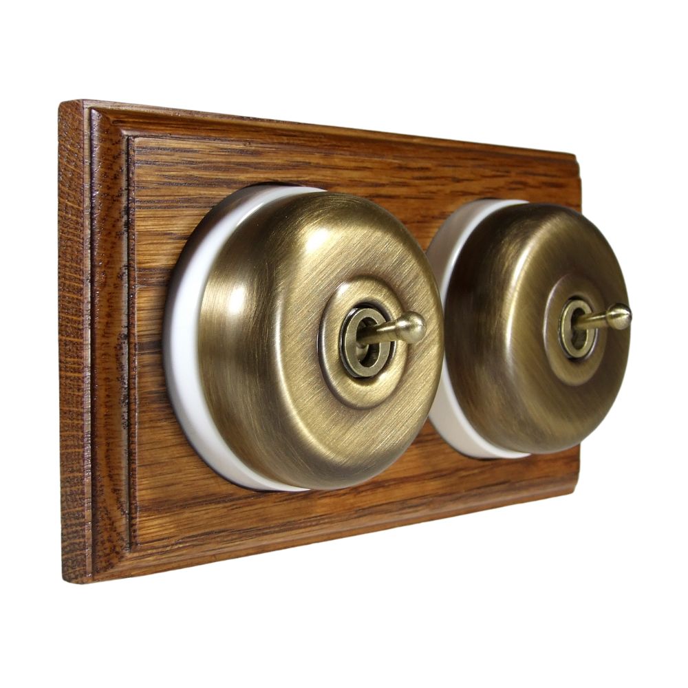 Period Smooth Antique Brass Dome Double Dolly Light Switch Medium Oak White Horizontal