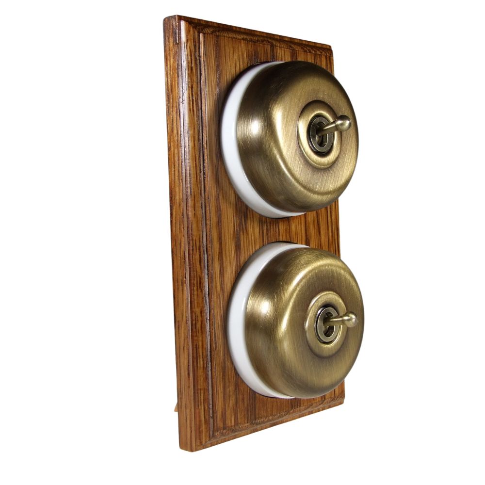 Period Smooth Antique Brass Dome Double Dolly Light Switch Medium Oak White Vertical