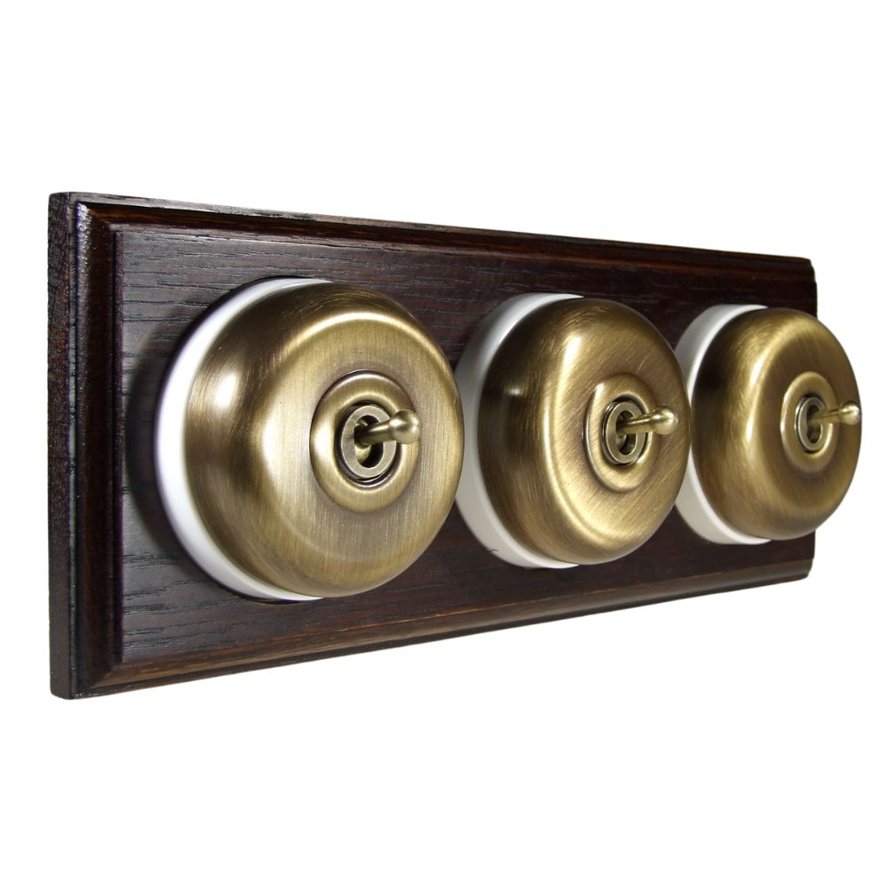 Period Smooth Antique Brass Dome Triple Dolly Light Switch Dark Oak White Horizontal