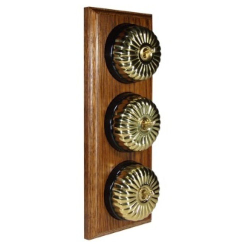 Period Fluted Polished Brass Dome Triple Dolly Light Switch Medium Oak Black Vertical