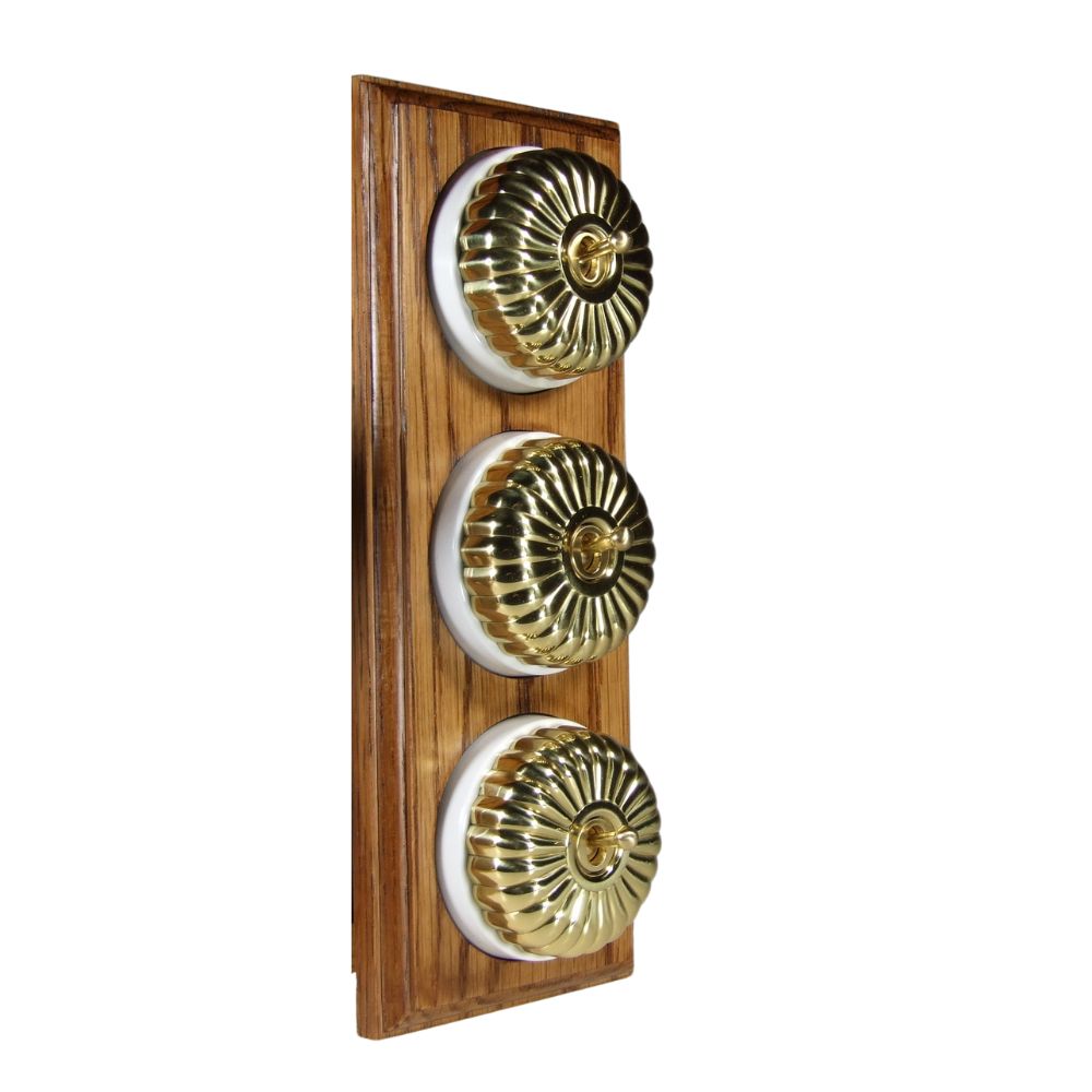 Period Fluted Polished Brass Dome Triple Dolly Light Switch Medium Oak White Vertical