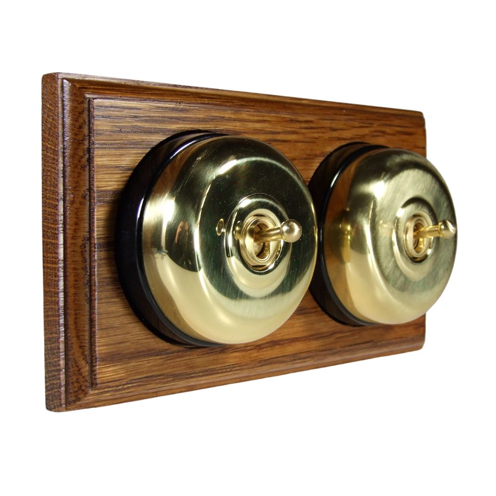 Period Smooth Polished Brass Dome Double Dolly Light Switch Medium Oak Black Horizontal