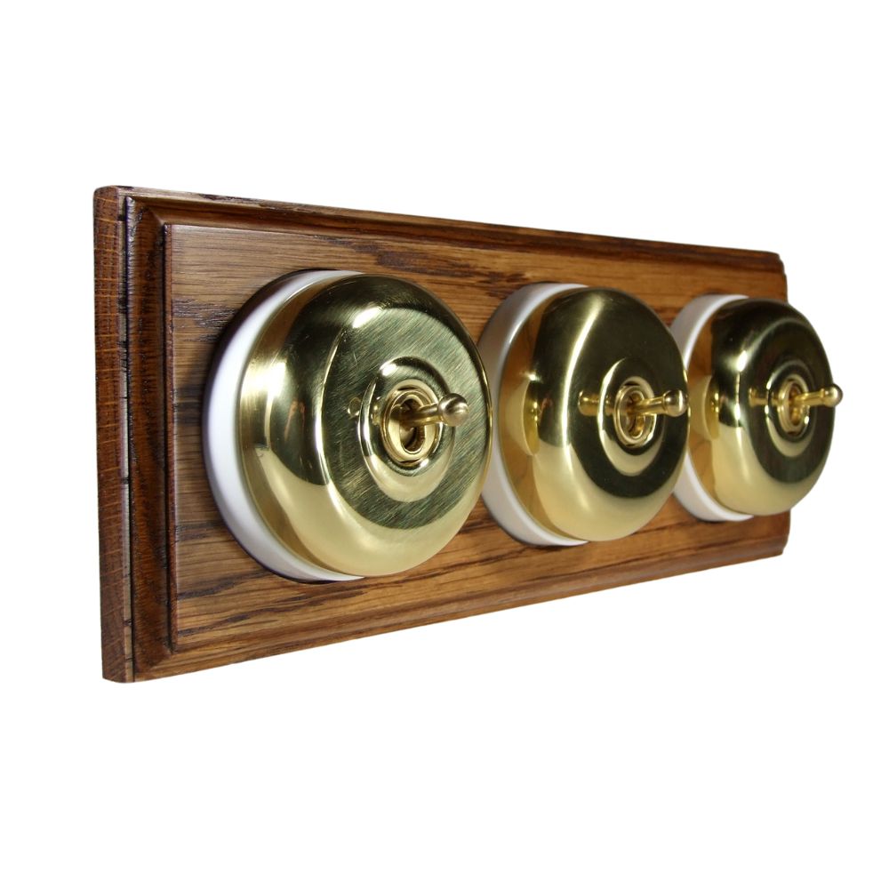 Period Smooth Polished Brass Dome Triple Dolly Light Switch Medium Oak White Horizontal