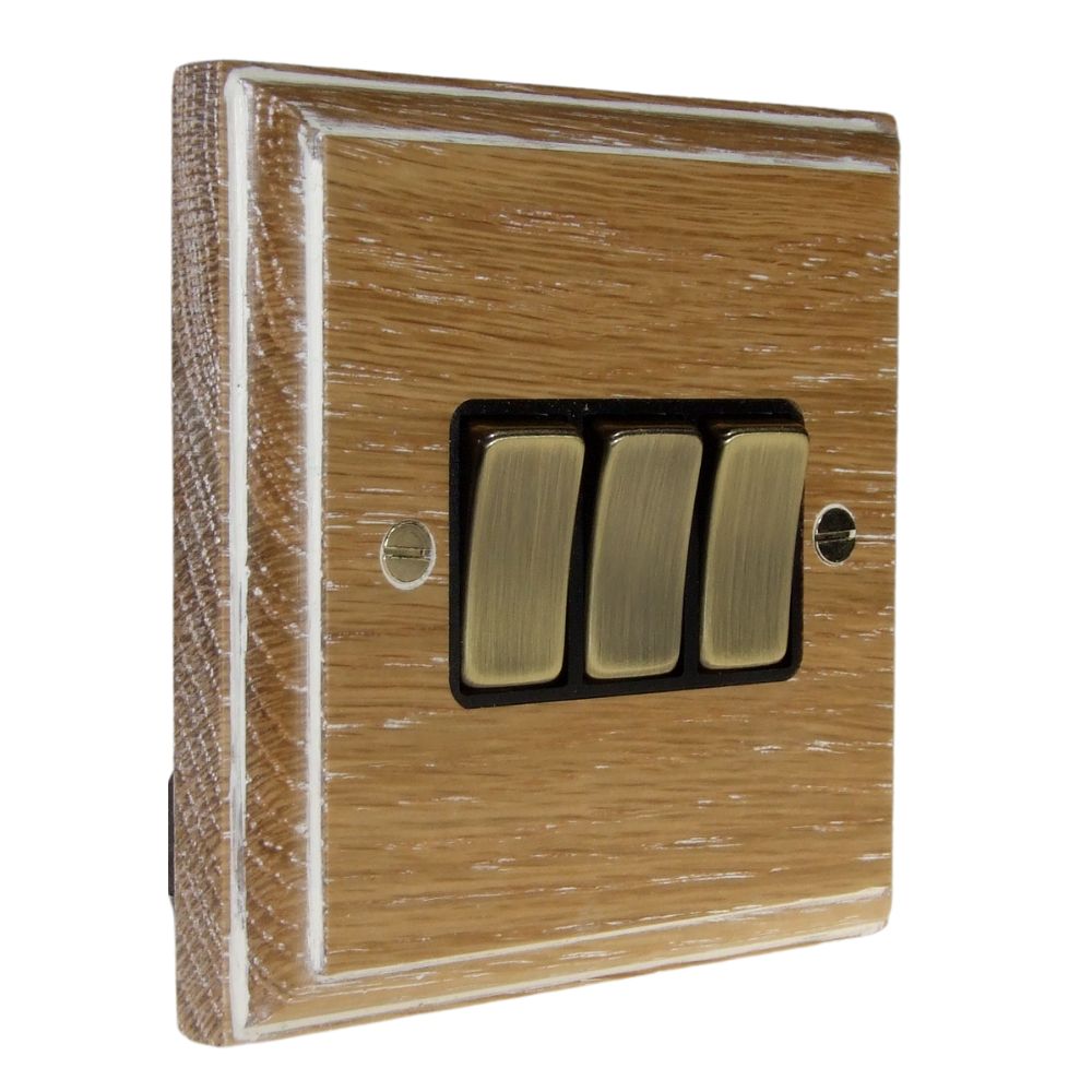 Classic Limed Oak Triple Light Switch Antique Brass and Black