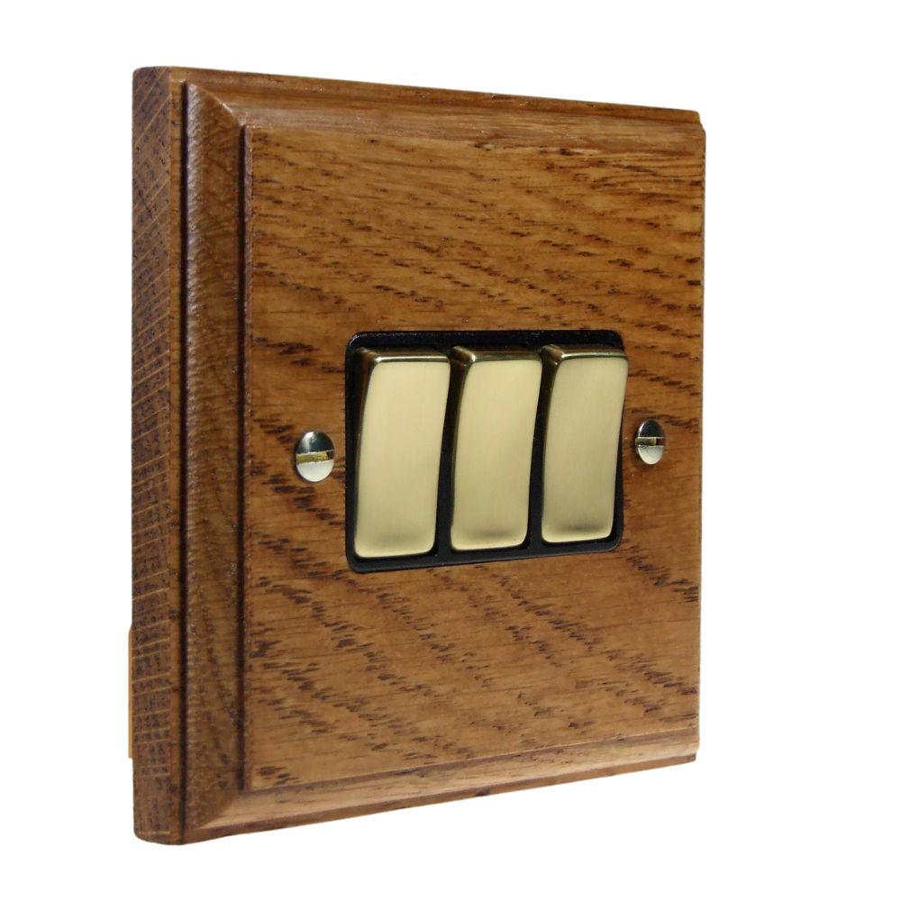 Classic Medium Oak Triple Light Switch Polished Brass and Black