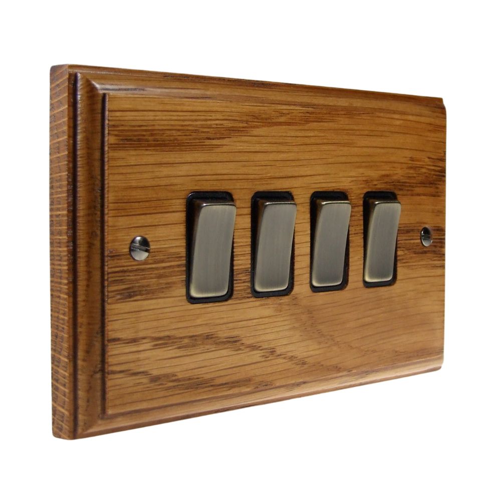Classic Medium Oak 4 Switch Light Switch Antique Brass and Black