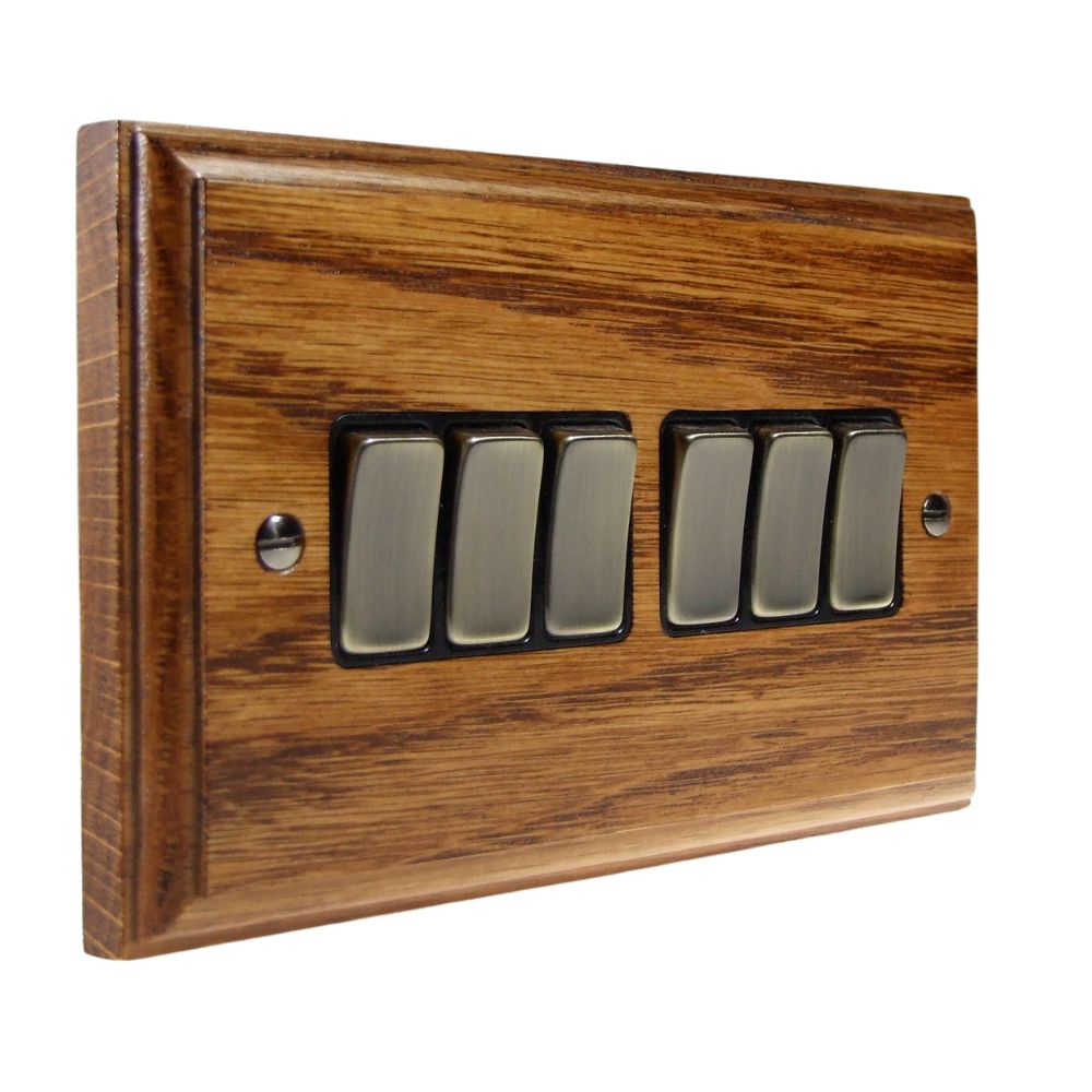 Classic Medium Oak 6 Switch Light Switch Antique Brass and Black