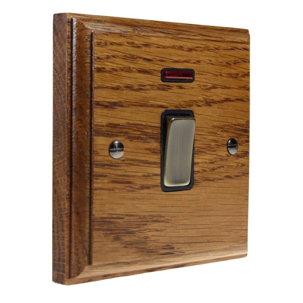 Classic Medium Oak Double Pole Light Switch with Neon Antique Brass and Black
