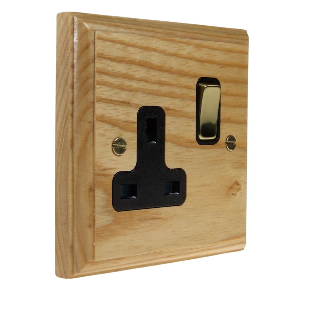 Classic Ash Single Switched Socket Polished Brass and Black