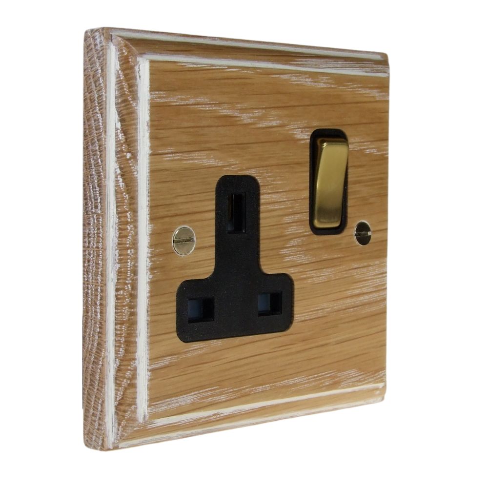 Classic Limed Oak Single Switched Socket Polished Brass and Black
