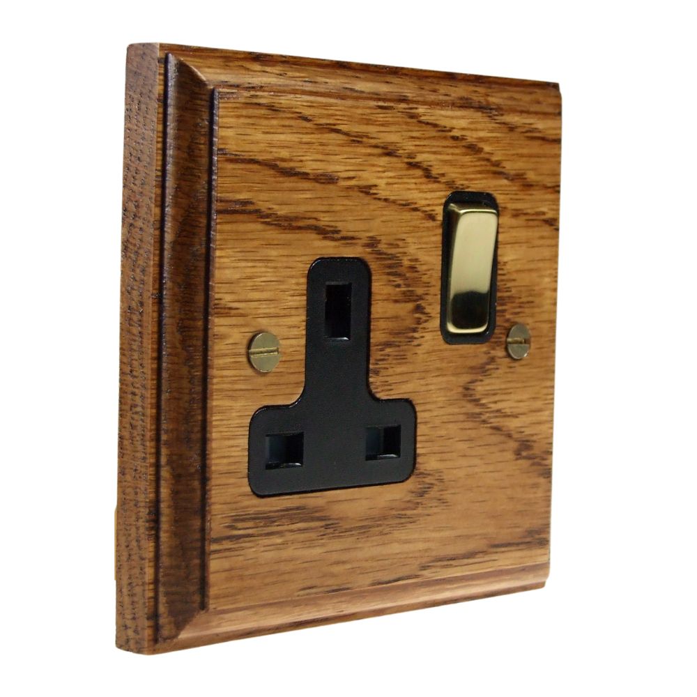 Classic Medium Oak Single Switched Socket Polished Brass and Black