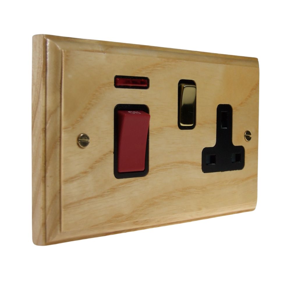 Classic Ash Double Pole Cooker Switch with Single Switched Socket Polished Brass and Black