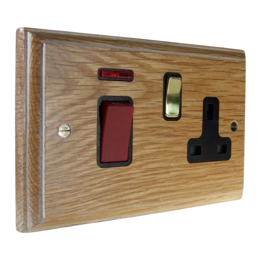 Classic Limed Oak Double Pole Cooker Switch with Single Switched Socket Polished Brass and Black
