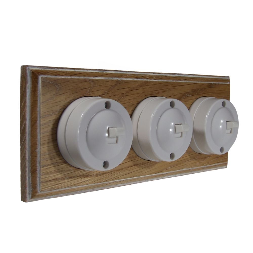 Linden White 3-Gang Horizontal 2-Way Bakelite Switch in Limed Oak