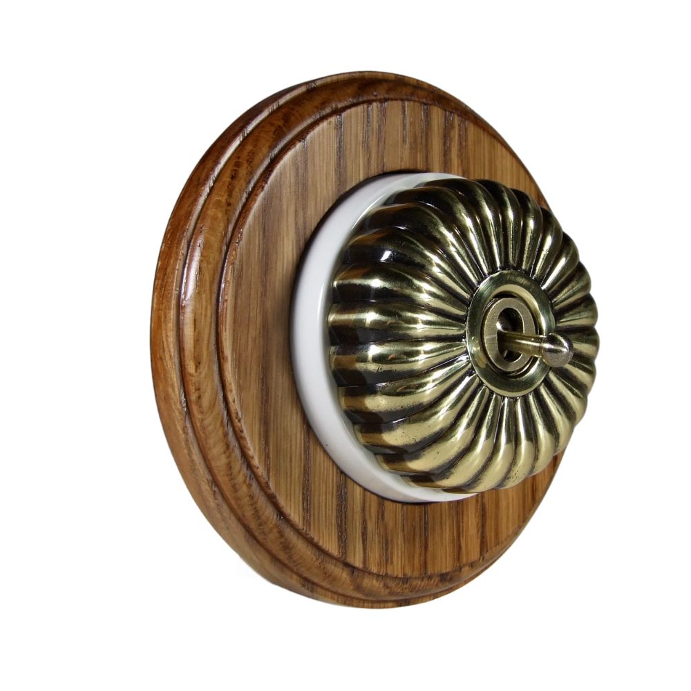Period Fluted Antique Brass Dome Single Dolly Light Switch Medium Oak White Round Base