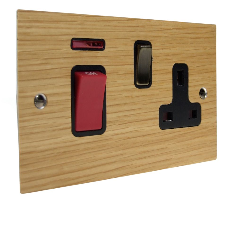 Oak Veneer Double Pole Cooker Switch with Single Switched Socket Antique Brass and Black