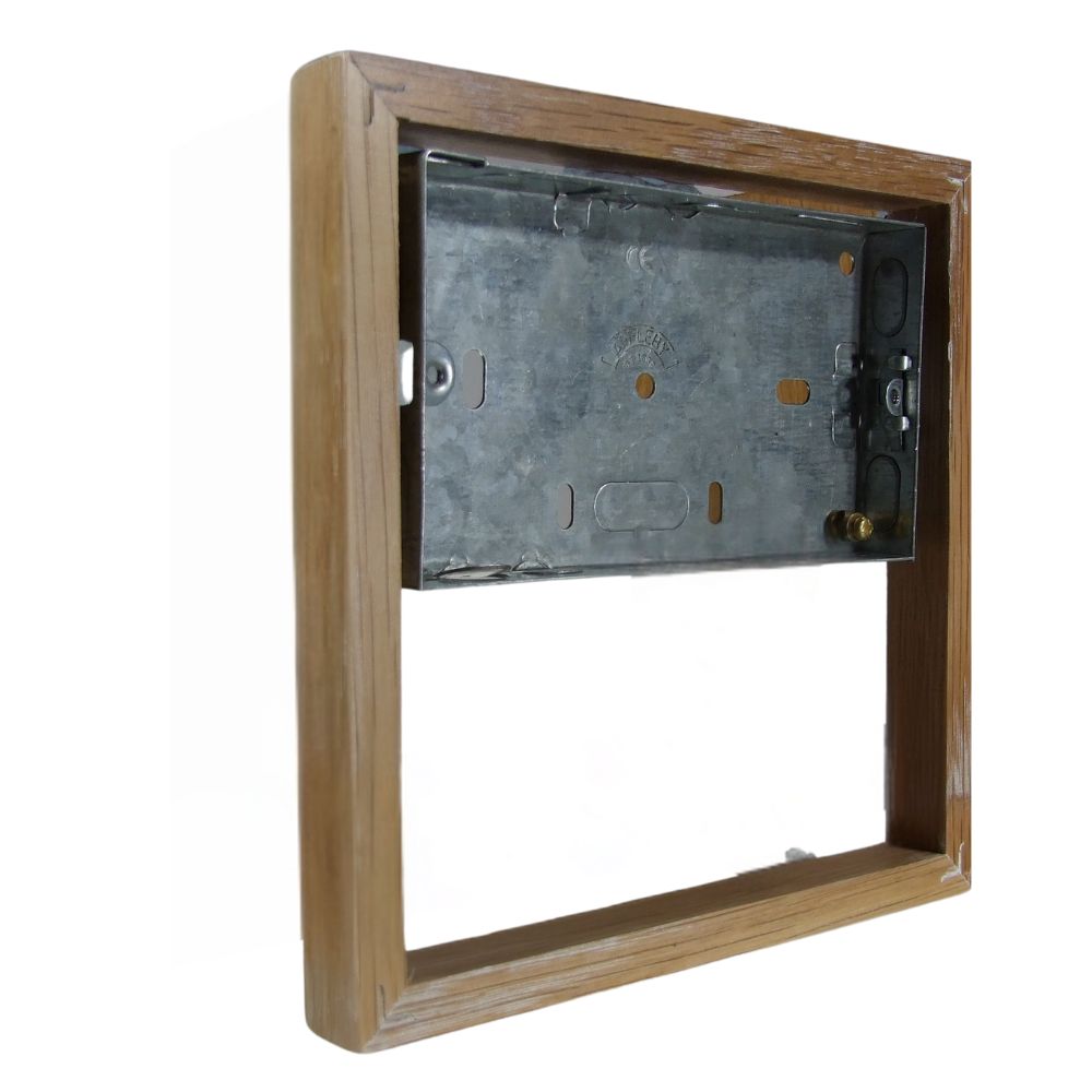 Bakelite 18mm 4-Gang Surface Mounting Pattress in Limed Oak Bakelite 18mm 4-Gang Surface Mounting Pattress in Limed Oak