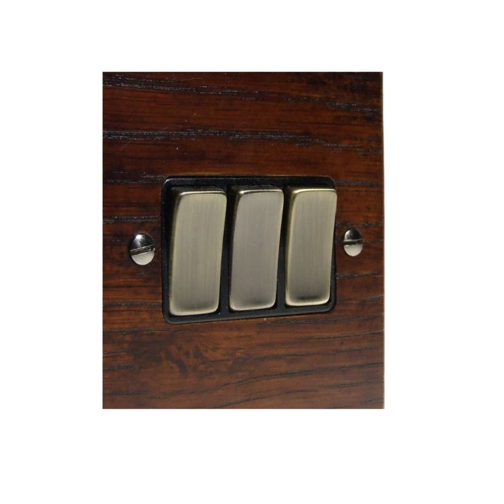 Bevelled Dark Oak Triple Light Switch Antique Brass and Black