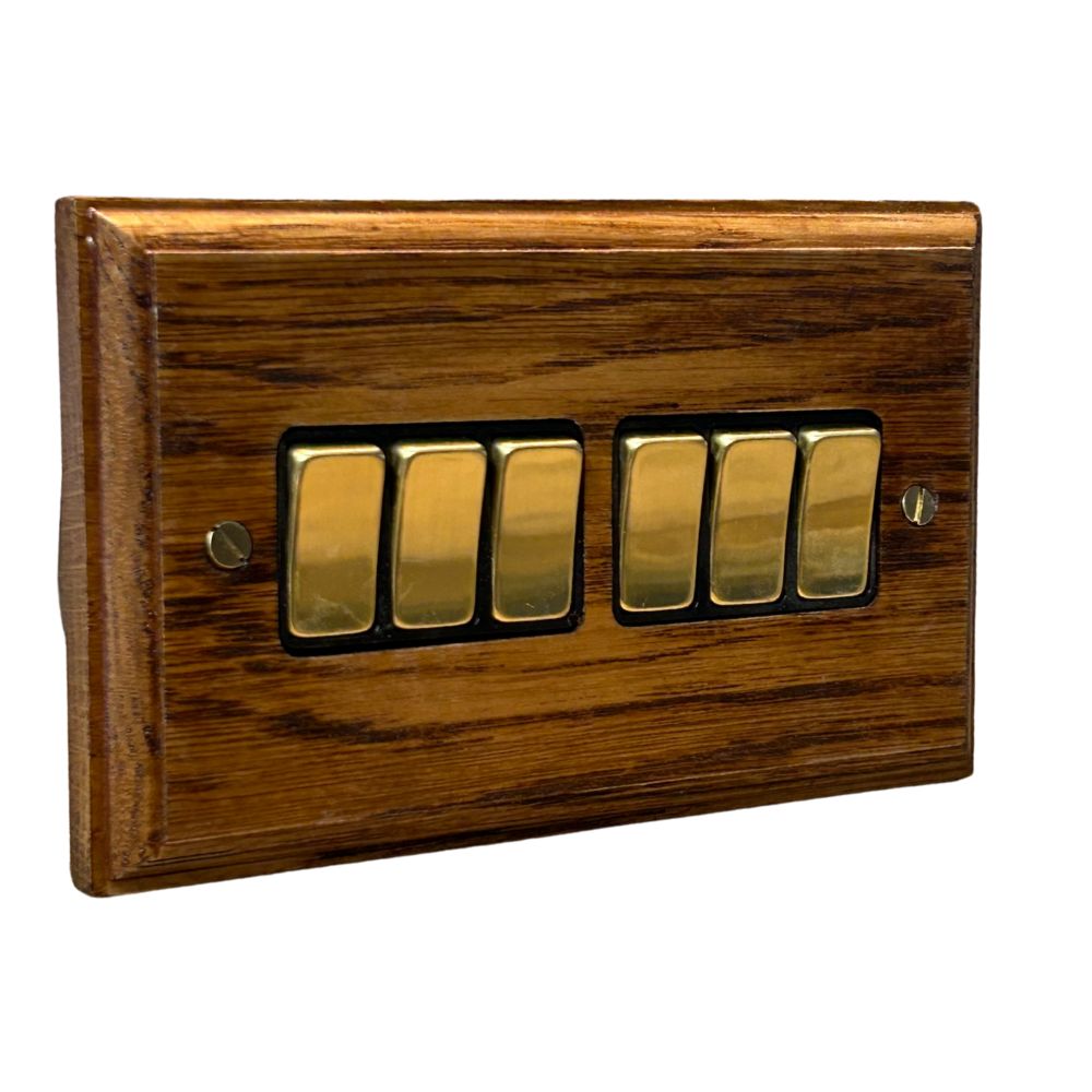 Classic Medium Oak 6 Switch Light Switch Polished Brass and Black