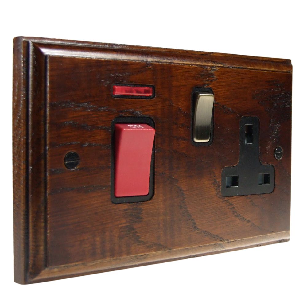 Classic Dark Oak Double Pole Cooker Switch with Single Switched Socket Antique Brass and Black