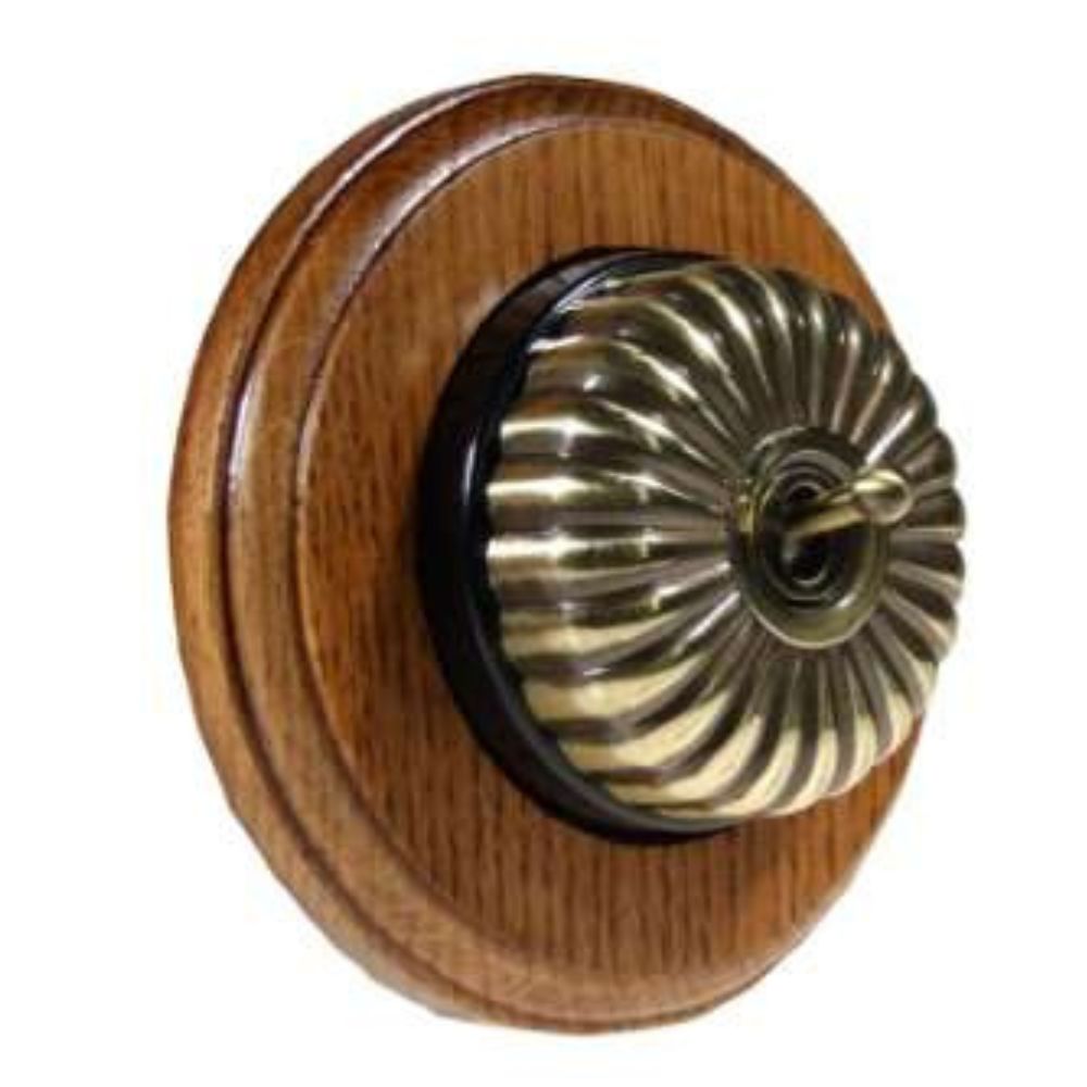 Period Fluted Antique Brass Dome Single Intermediate Dolly Light Switch Medium Oak Black Round Base